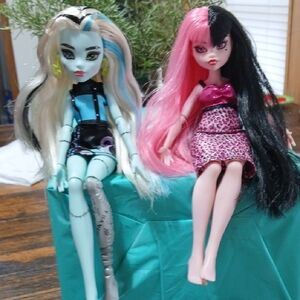 Monster High Dolls with Blue, Pink, and Black Hair